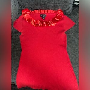 Cute red shirt with silk petals around the collar